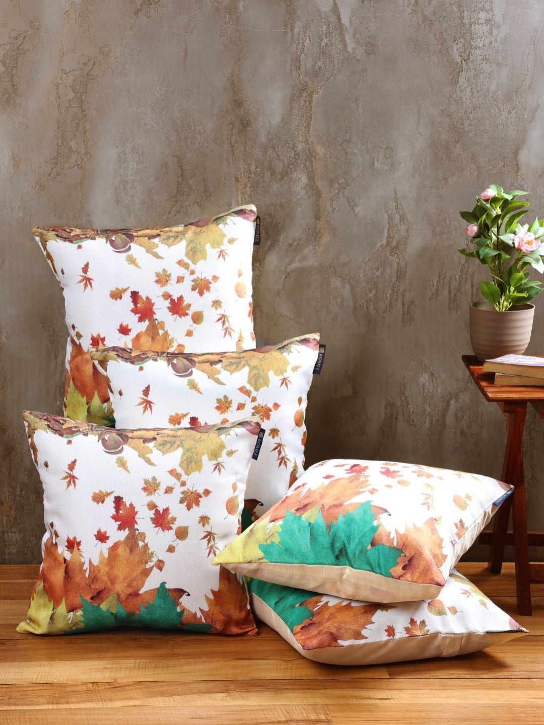 

Aura White & Brown 5 Pieces Floral Printed Jute Cotton Square Cushion Covers