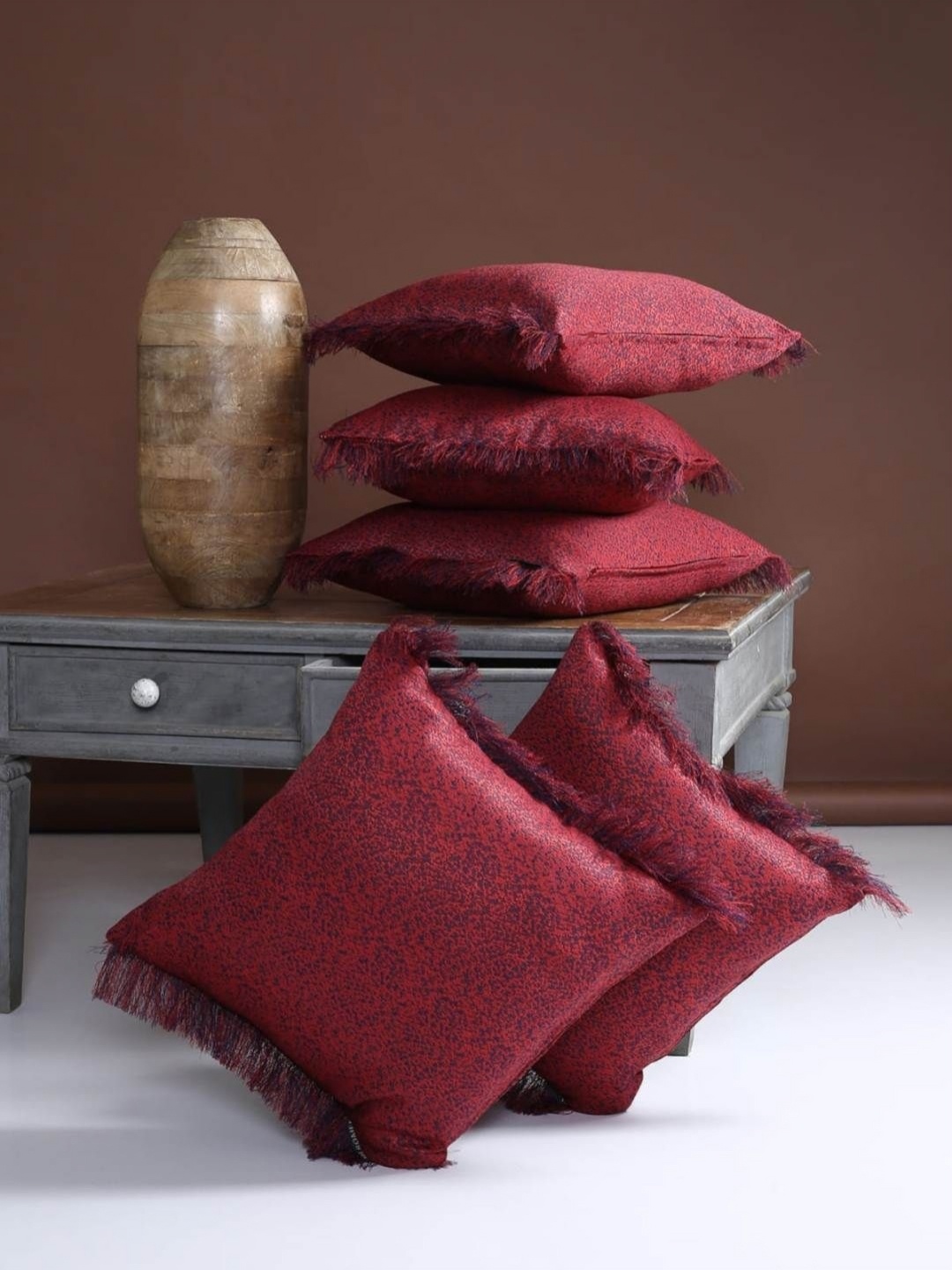 

Aura Maroon 5 Pieces Self Design Textured Square Cushion Covers