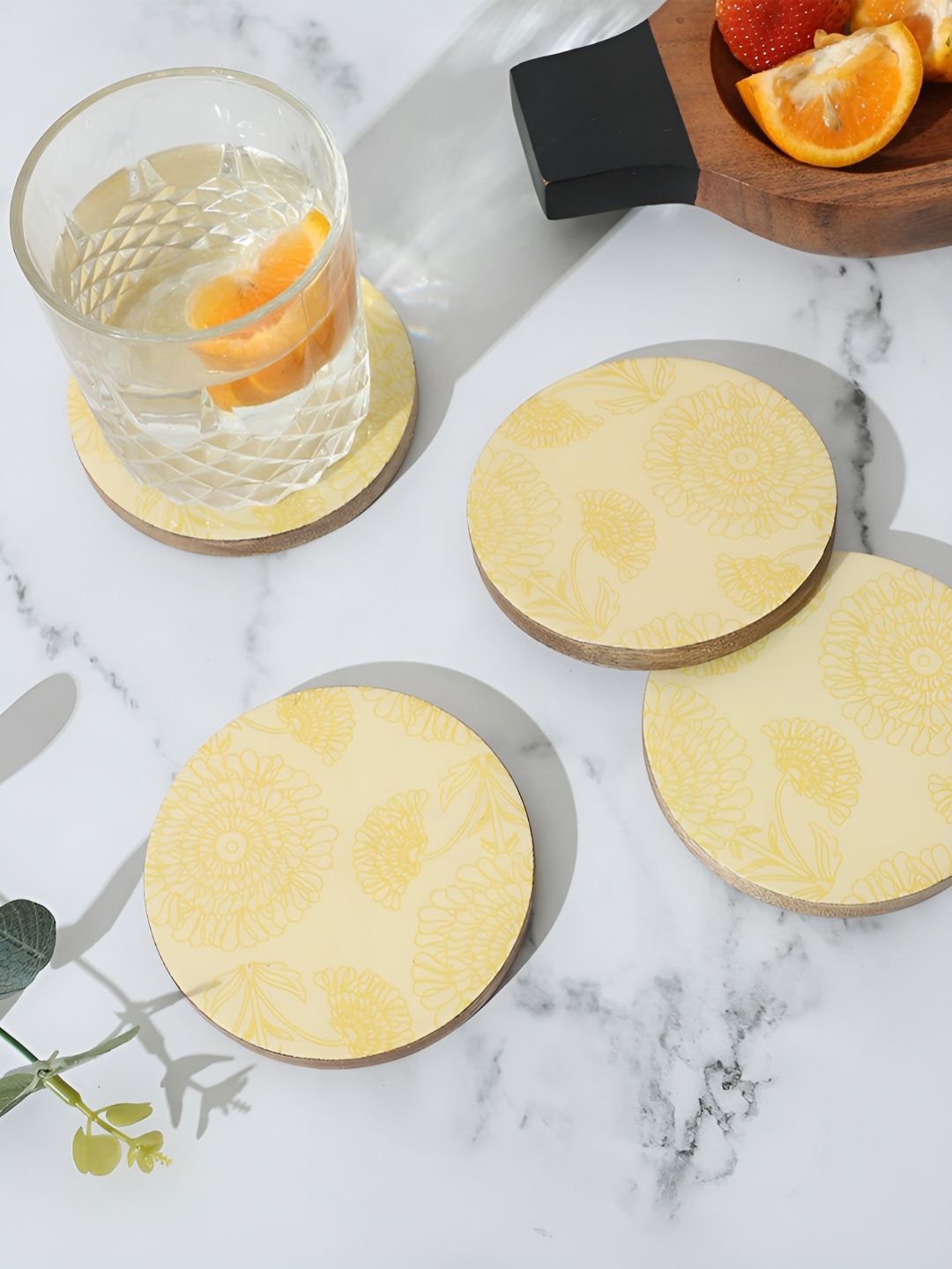 

Ireka Homes Yellow 4 Pieces Printed Wooden Round Coasters