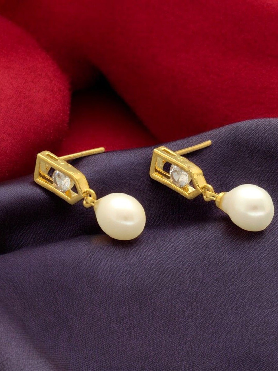 

Sri Jagdamba Gold-Plated Pearls Studded Contemporary Shaped Drop Earrings