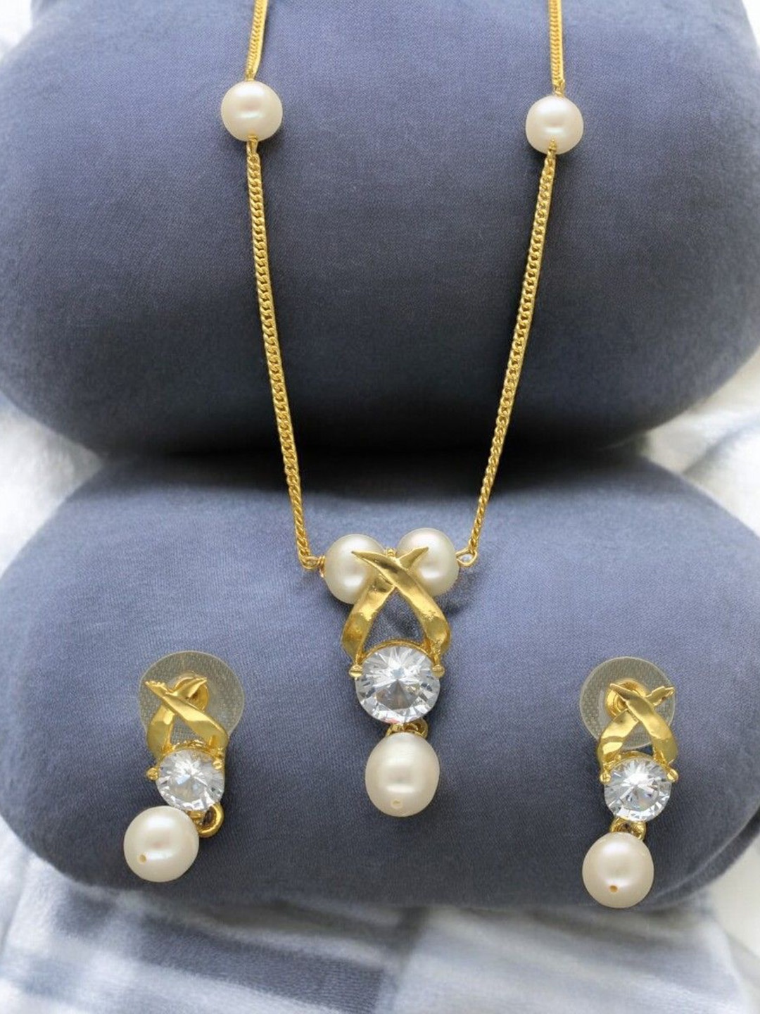 

Sri Jagdamba Pearls Dealer Gold Plated CZ Stone Studded & Beaded Necklace and Earrings