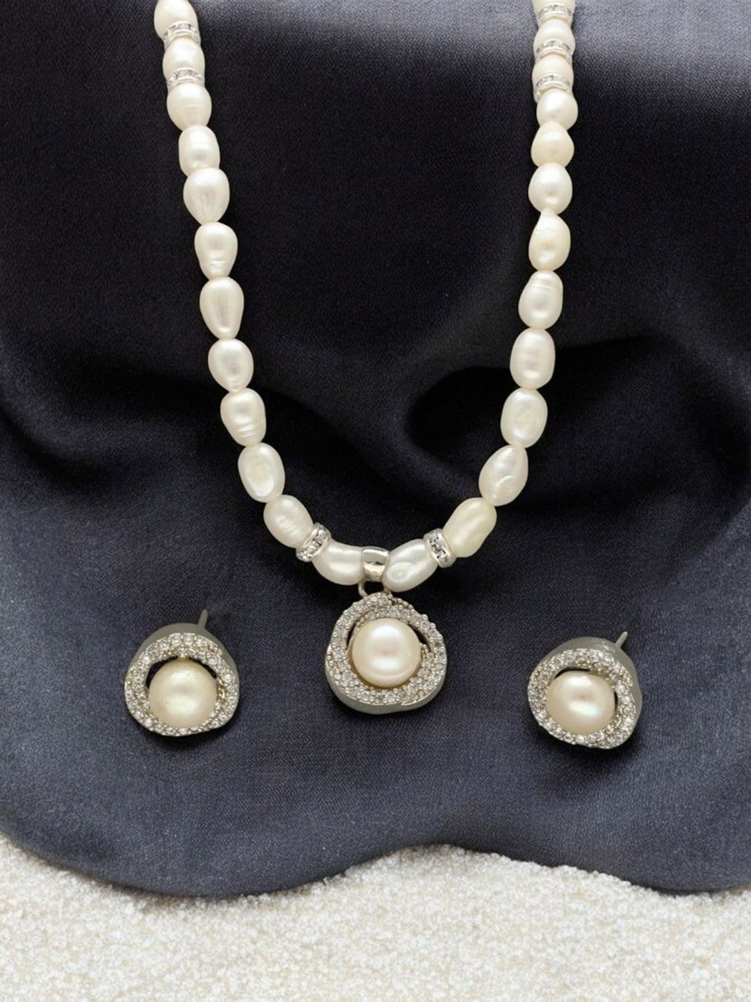 

Sri Jagdamba Pearls Dealer Silver Plated CZ Stone Studded & Beaded Necklace and Earrings