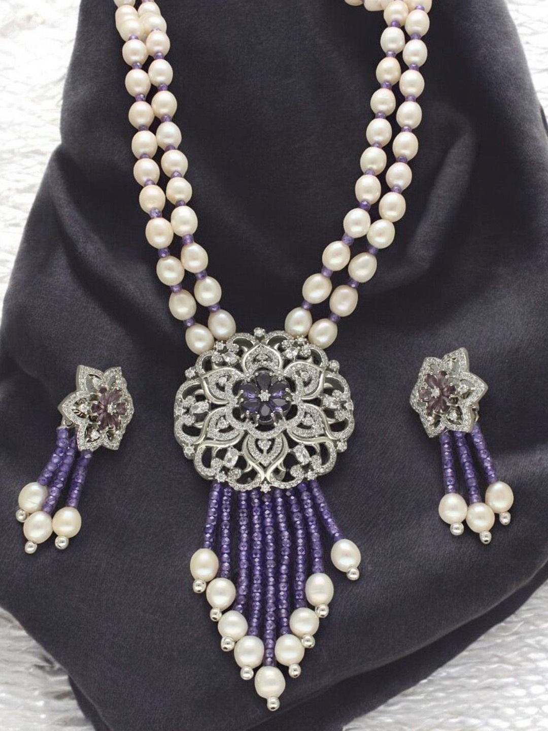 

Sri Jagdamba Pearls Dealer Silver Plated CZ Stone Studded & Beaded Jewellery Set