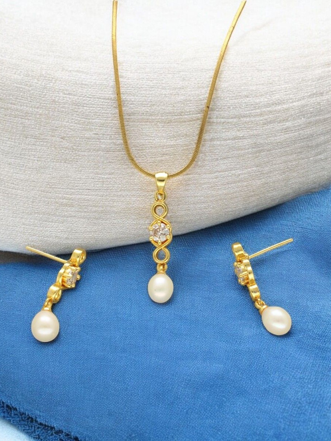

Sri Jagdamba Pearls Dealer Gold Plated CZ Stone Studded & Beaded Jewellery Set