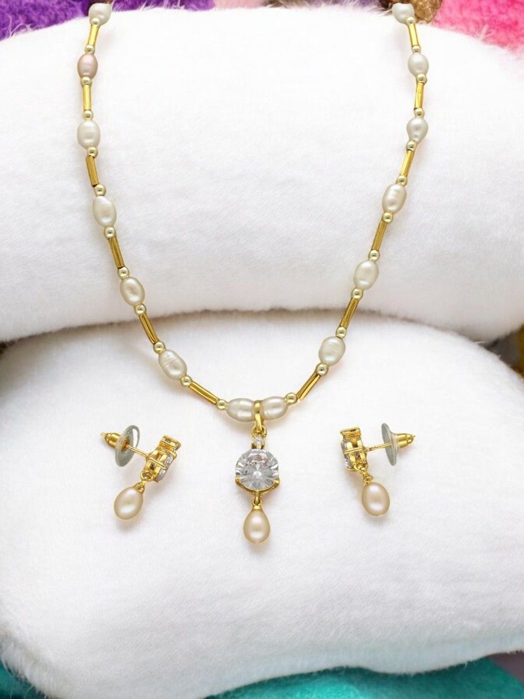 

Sri Jagdamba Pearls Dealer Gold Plated CZ Stone Studded & Beaded Jewellery Set