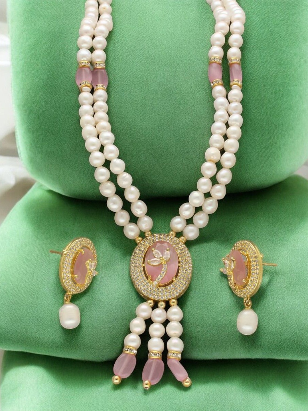 

Sri Jagdamba Pearls Dealer Gold Plated CZ Stone Studded & Beaded Jewellery Set