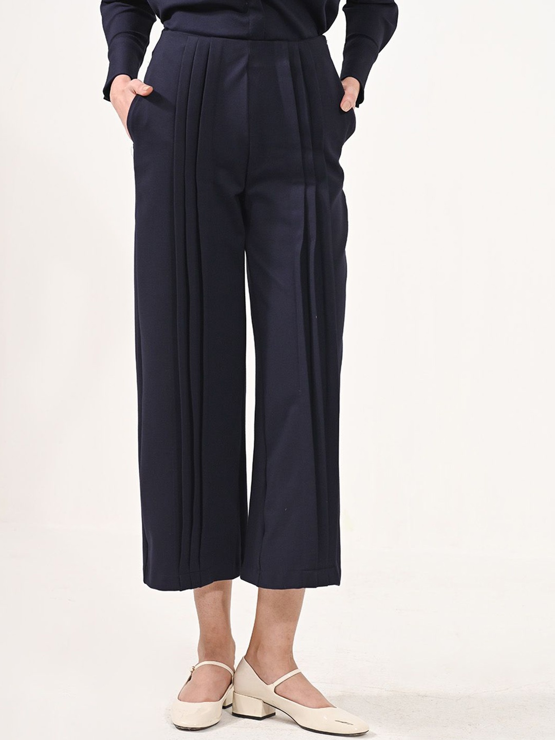 

Aamili Women Straight Fit Plain Pleated Trousers, Blue