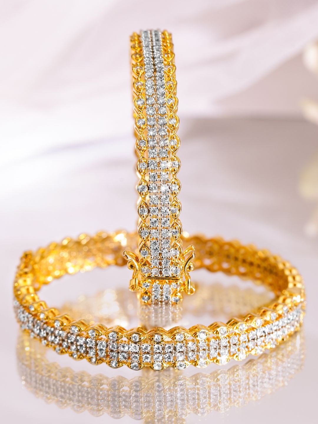 

Rubans Set of 2 22K Gold-Plated Cubic Zirconia Studded Elegant Designer Bangles