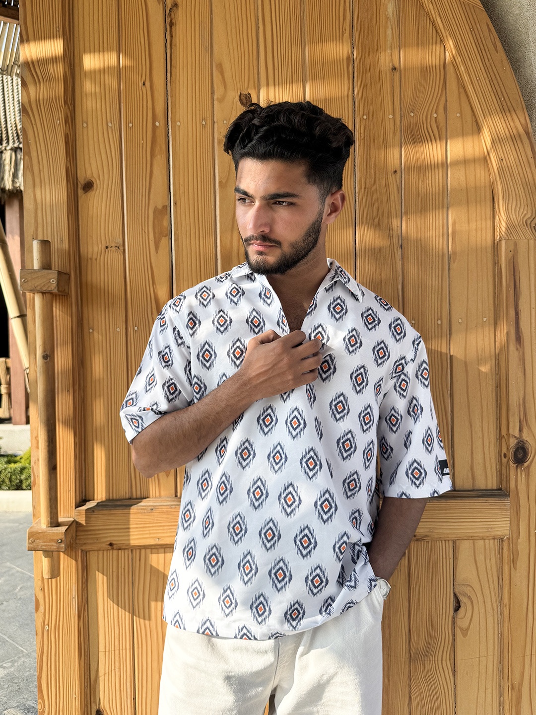 

UNRL Geometric Printed Polo Collar Drop-Shoulder Sleeves Relaxed Fit T-Shirt, White