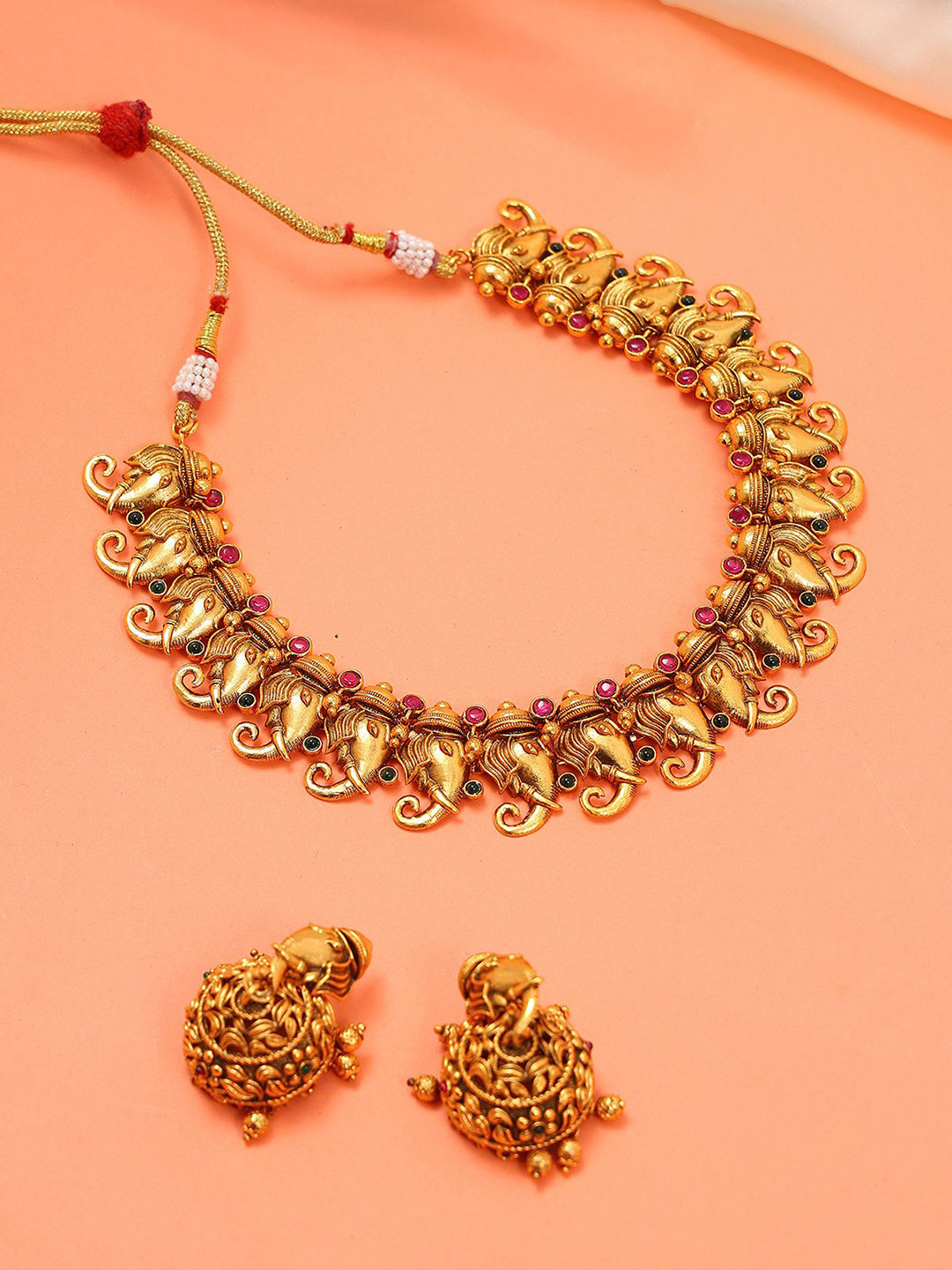 

Exotic India Traditional Ganesha Stone Studded Necklace and Earrings Jewellery Set, Gold