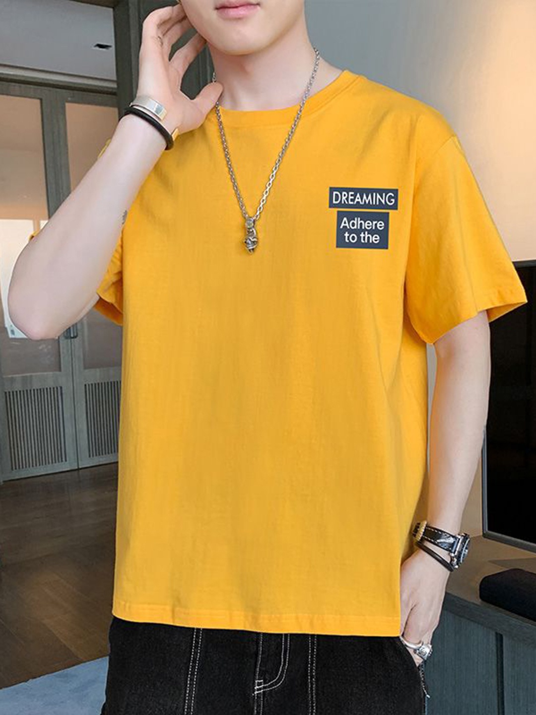 

StyleCast x Revolte Men Typography Printed Round Neck Relaxed Fit T-shirt, Yellow