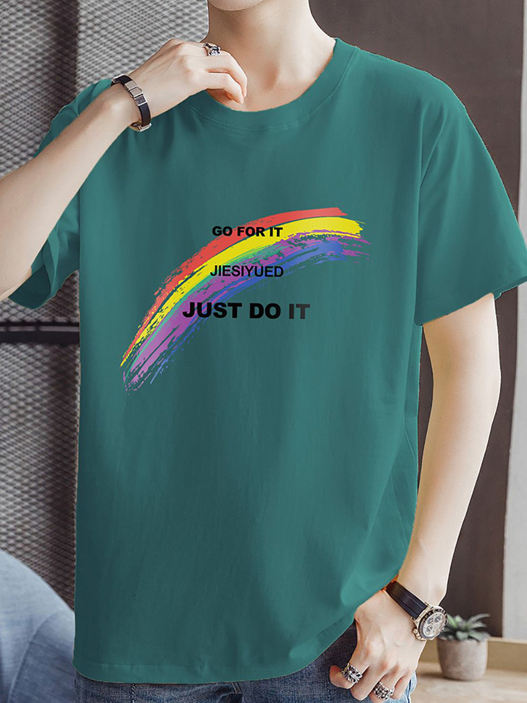 

StyleCast x Revolte Men Typography Printed Round Neck T-shirt, Green