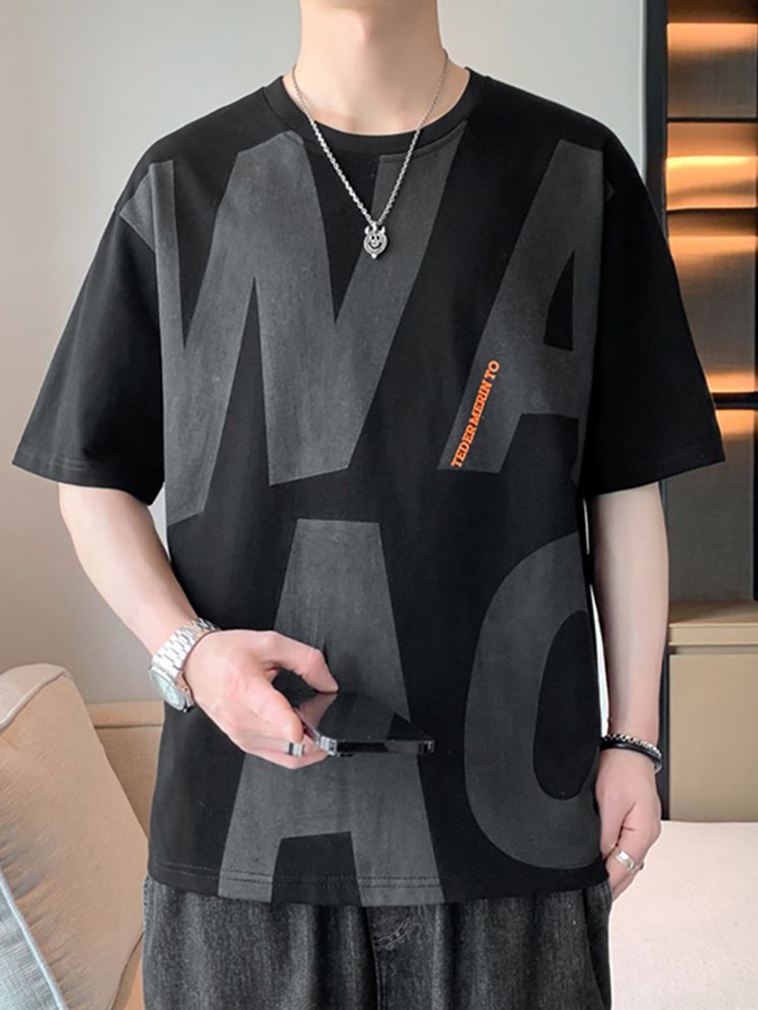 

StyleCast x Revolte Men Typography Printed Round Neck Relaxed Fit T-shirt, Black