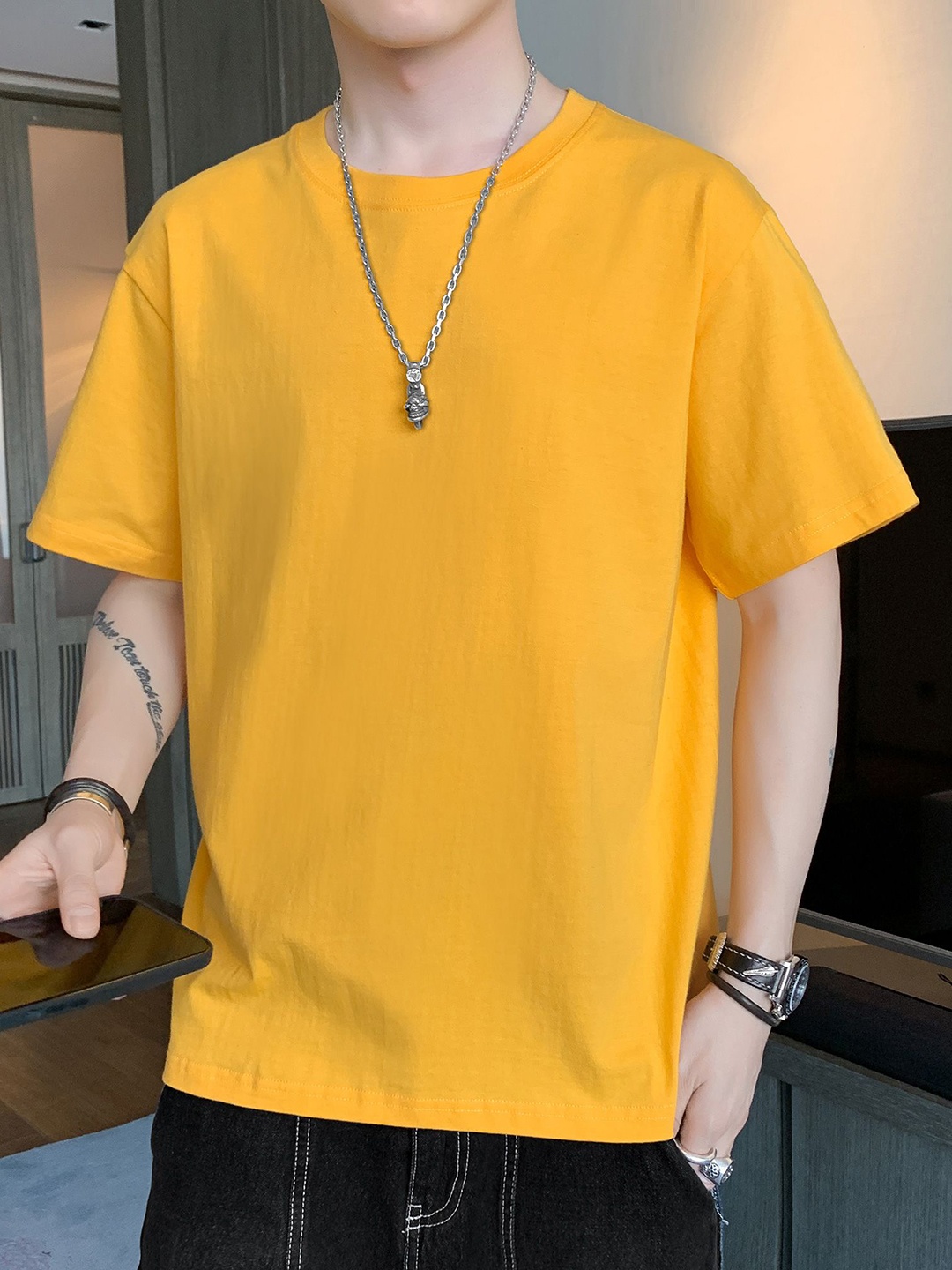 

StyleCast x Revolte Men Solid Round Neck Relaxed Fit T-shirt, Yellow