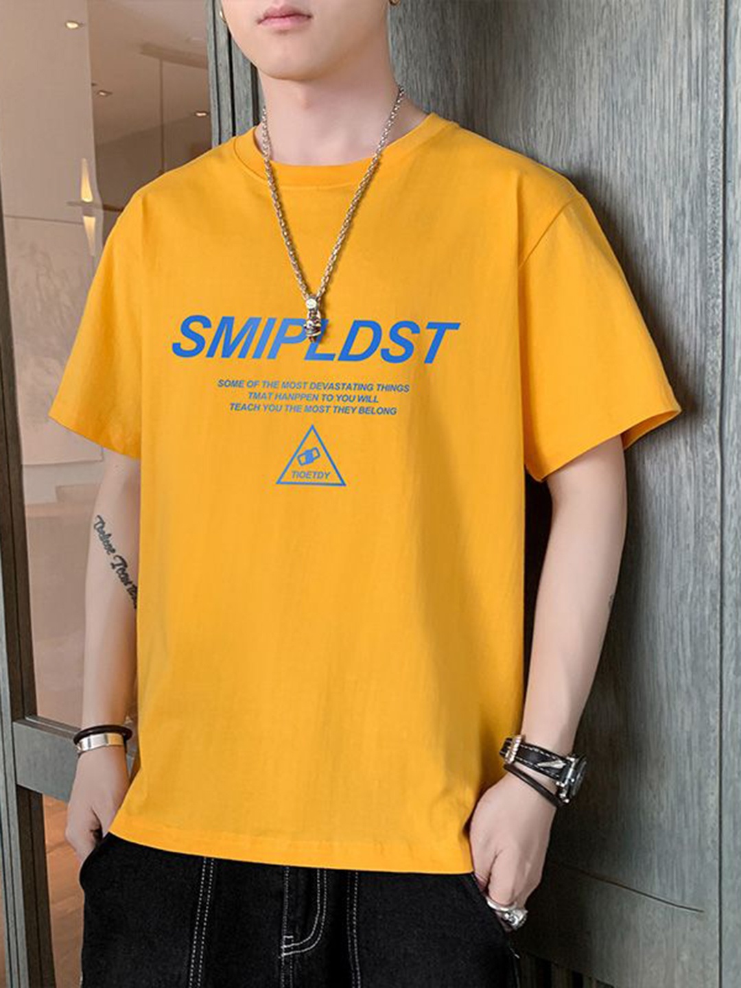 

StyleCast x Revolte Men Typography Printed Round Neck T-shirt, Mustard