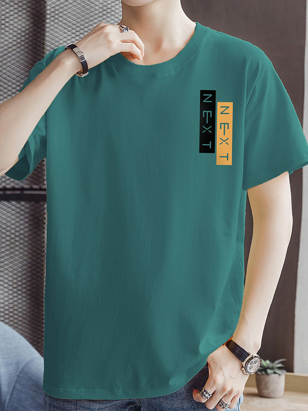 

StyleCast x Revolte Men Typography Printed Round Neck Relaxed Fit T-shirt, Teal