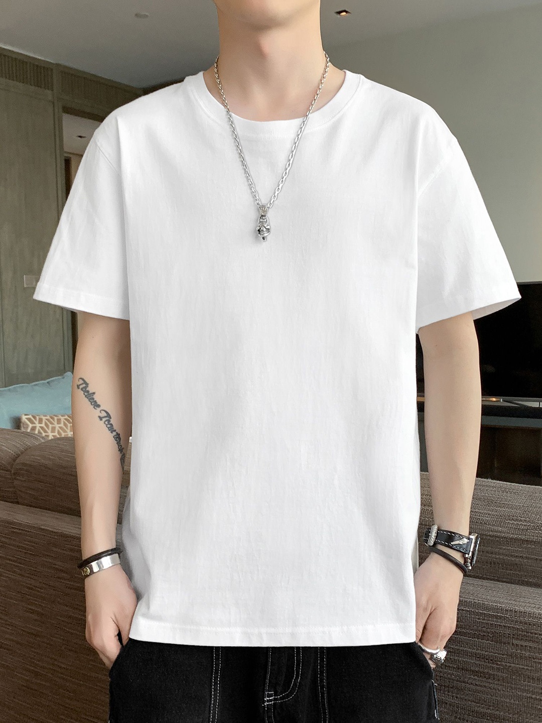 

StyleCast x Revolte Men Solid Round Neck Relaxed Fit T-shirt, White