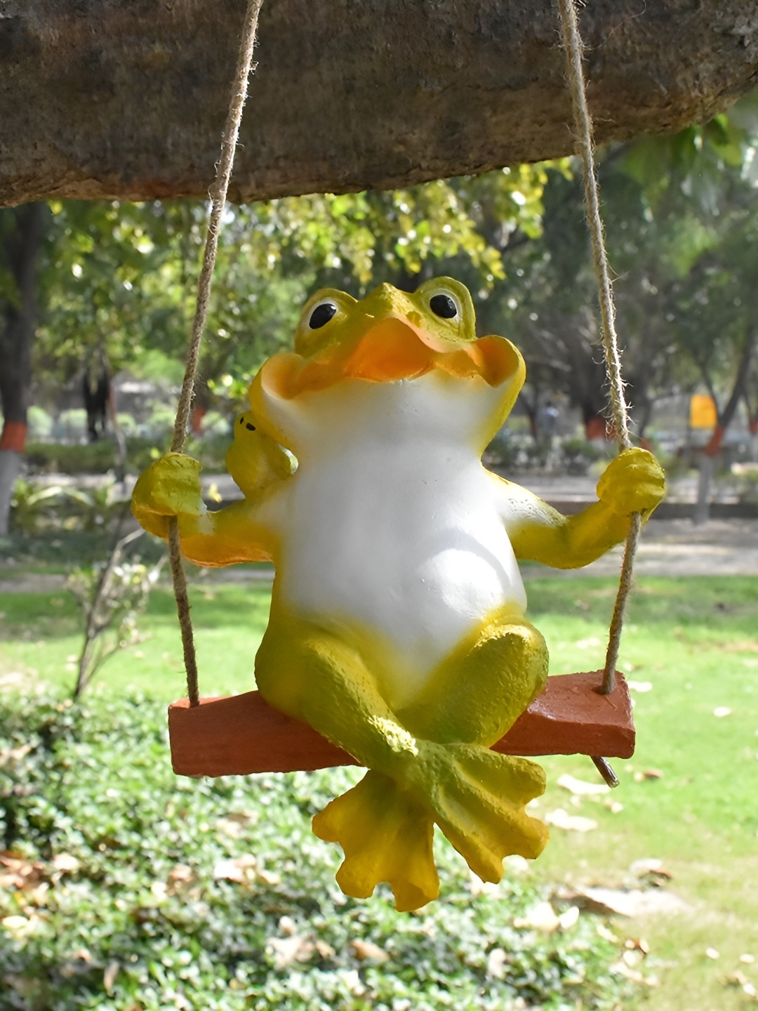

Vikarafty Green And White Frog On Swing Figurine Showpiece