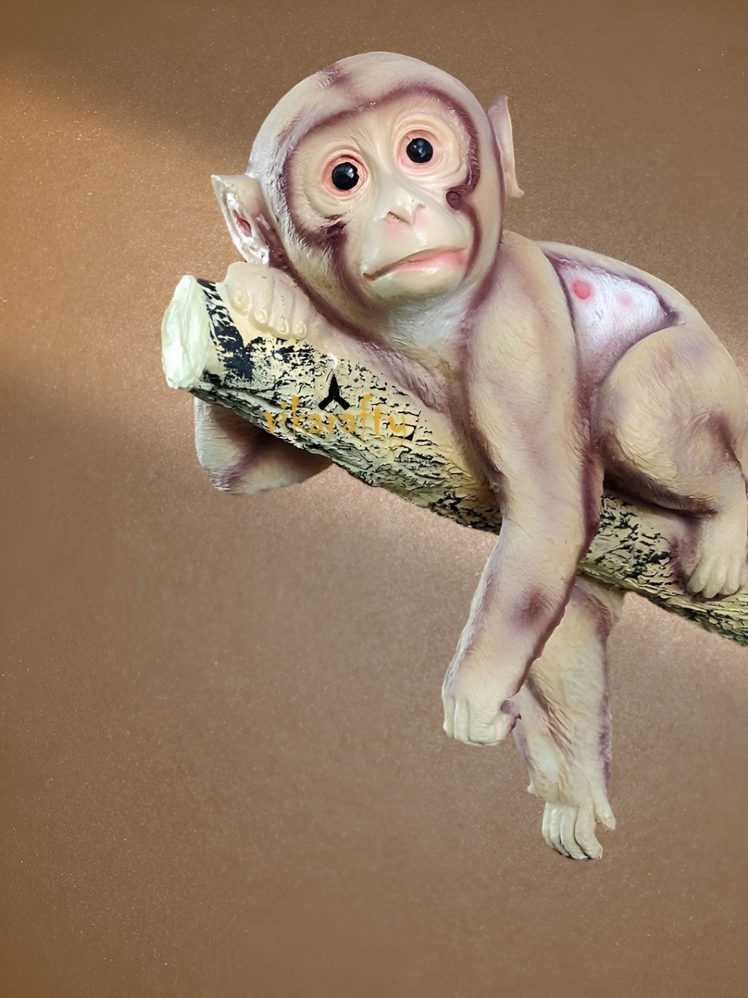 

Vikarafty Brown & White Hanging Monkey Birds and Animals Figurine Showpiece