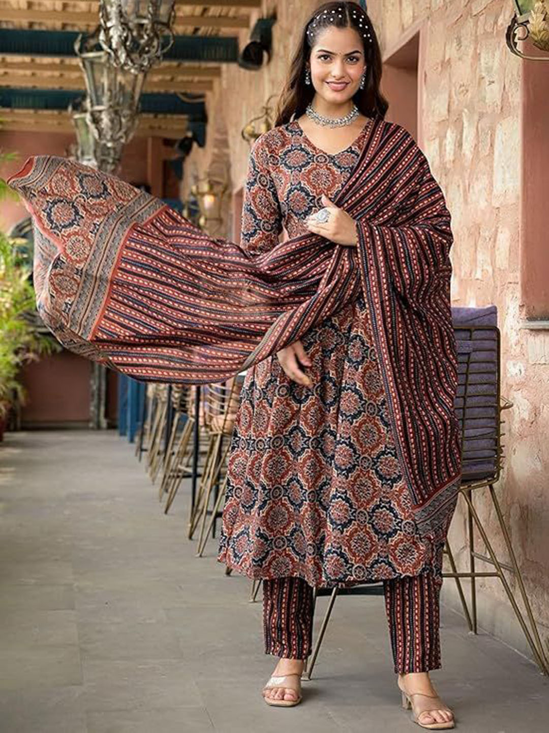 

AVAYAYAT Floral Printed Thread Work Anarkali Kurta with Trousers & Dupatta, Brown