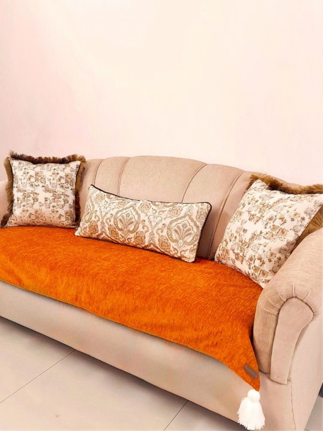 

THROWPILLOW Orange Colored & White 4 Seater Sofa Cover With Tassels