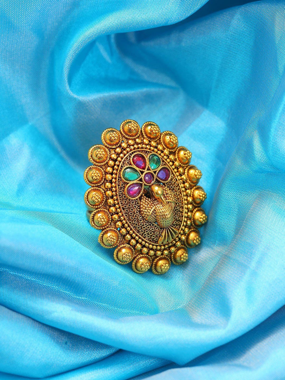 

Exotic India Peacock Design Oval Shape Adjustable Ring with Studded Stone, Gold