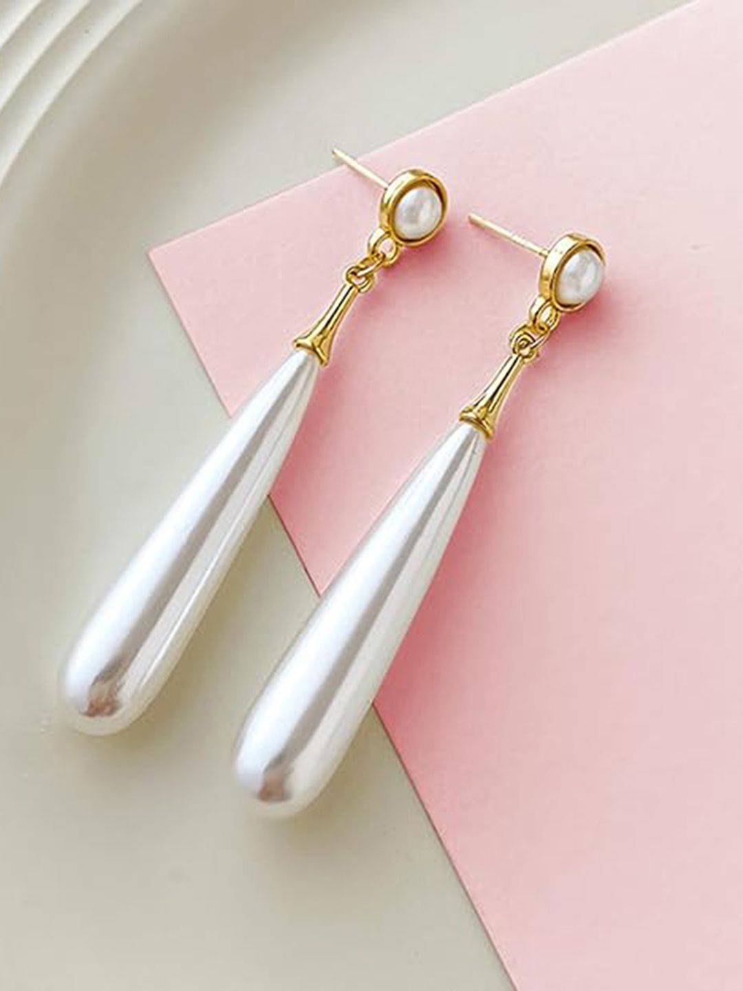

Peora Gold Plated Pearl Studded Contemporary Shaped Drop Earrings, White