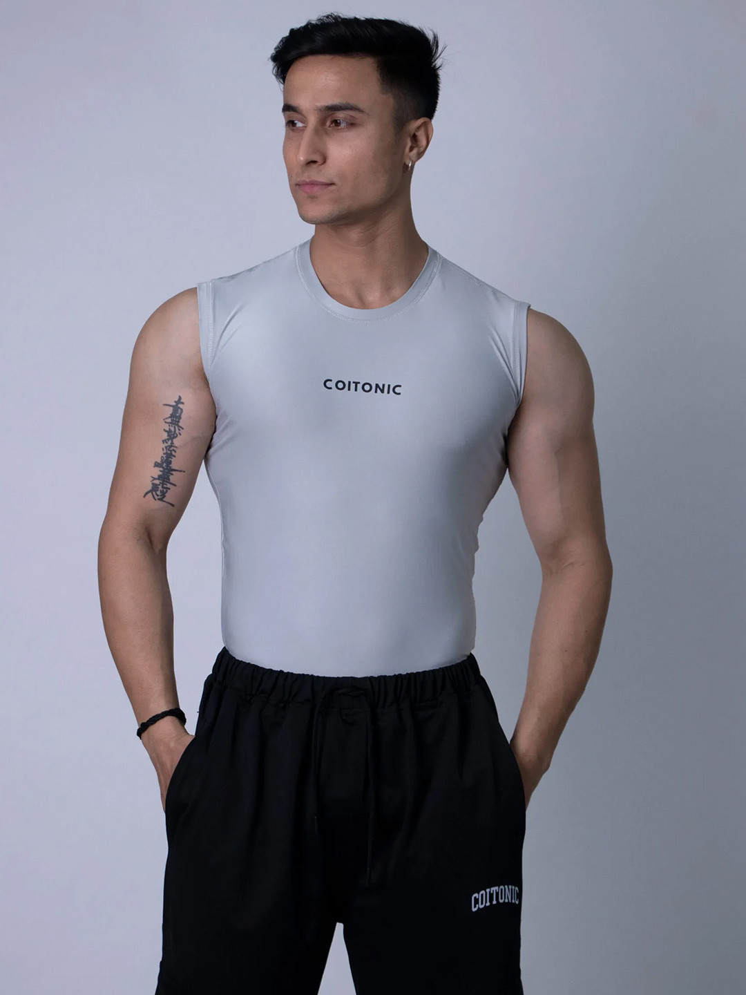 

Coitonic Men Typography Printed Sleeveless Compression Tank Tshirt, Grey