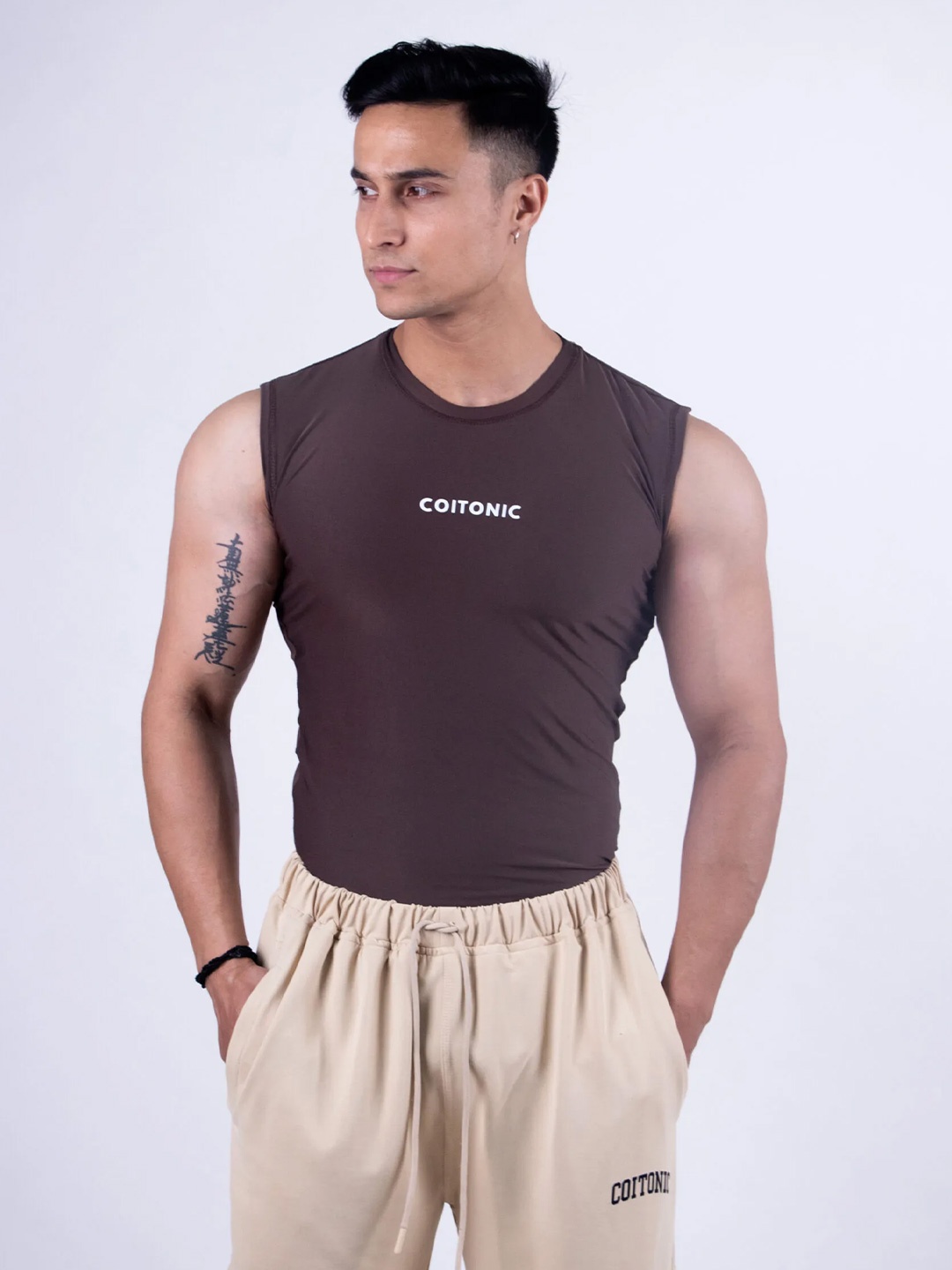 

Coitonic Men Typography Printed Sleeveless Compression Tank Tshirt, Brown