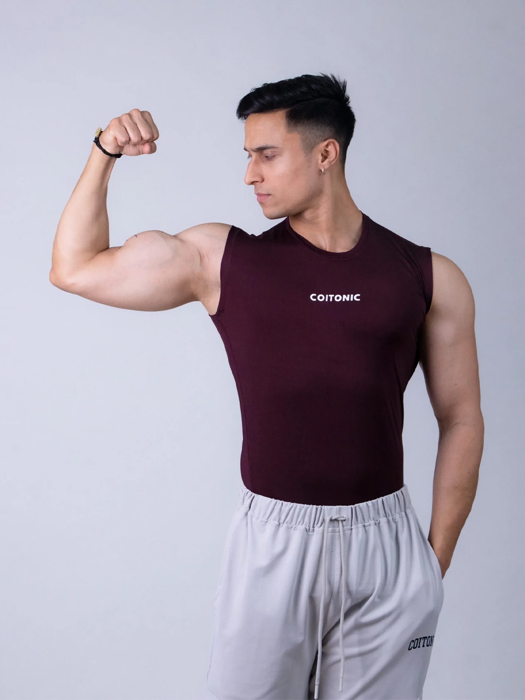 

Coitonic Men Typography Printed Sleeveless Compression Tank Tshirt, Maroon
