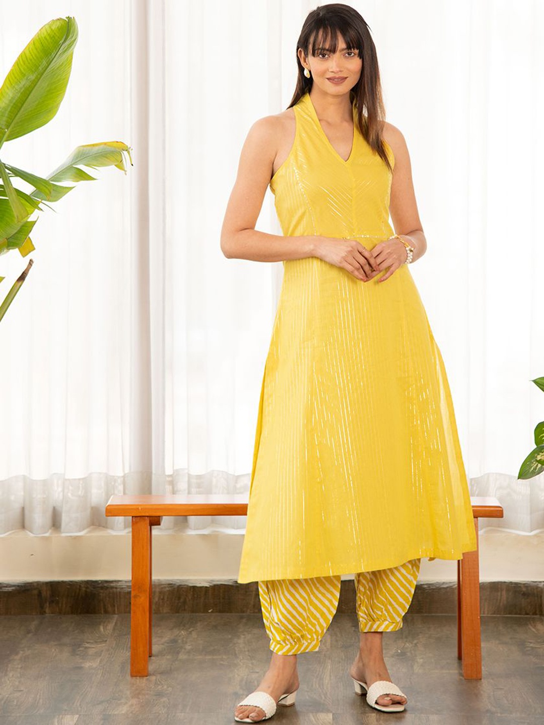 

Ekohum Striped V-Neck Sleeveless Sequinned Straight Kurta With Salwar, Yellow