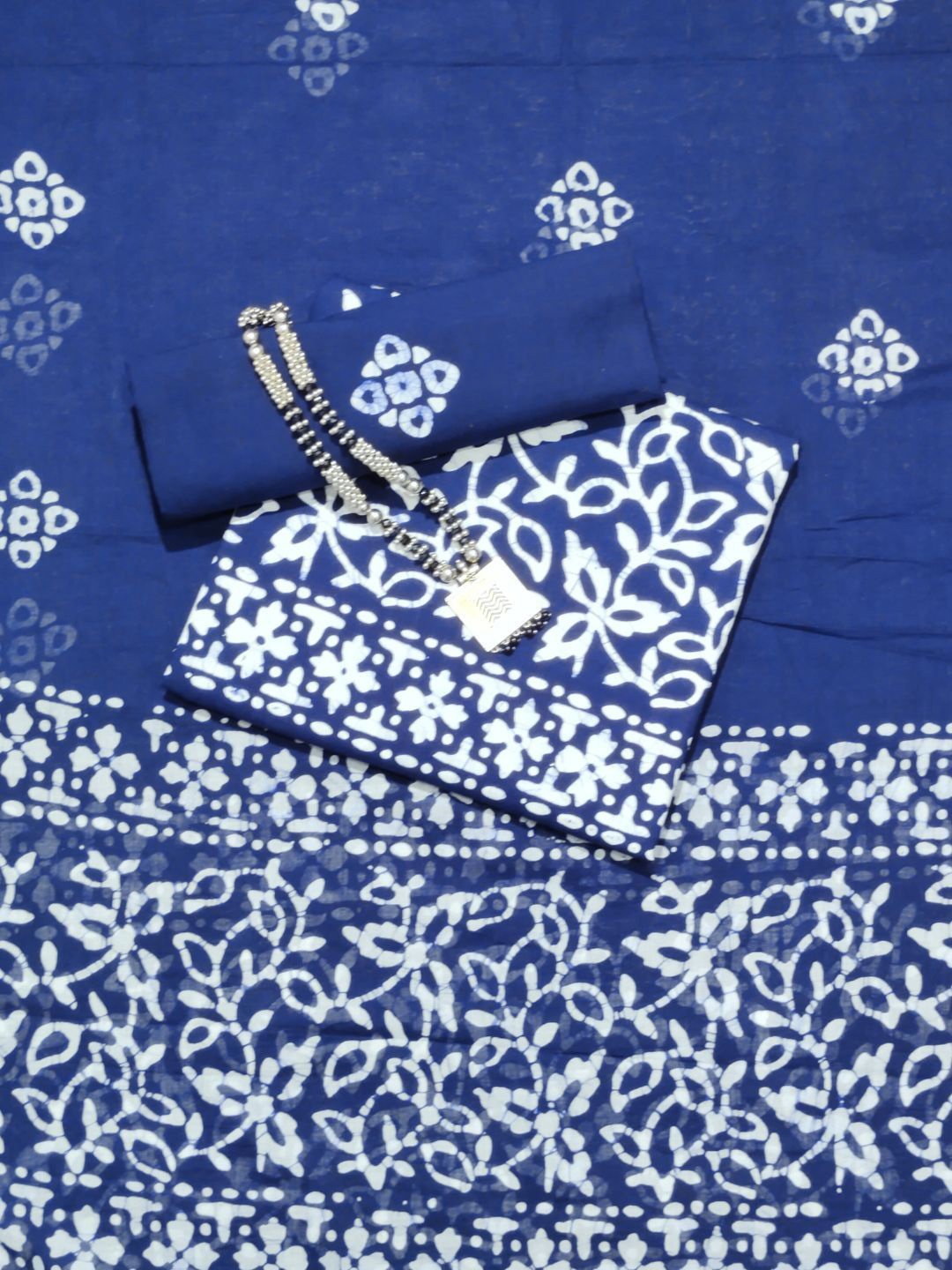 

Farooq Dyeing Printed Pure Cotton Unstitched Dress Material, Navy blue