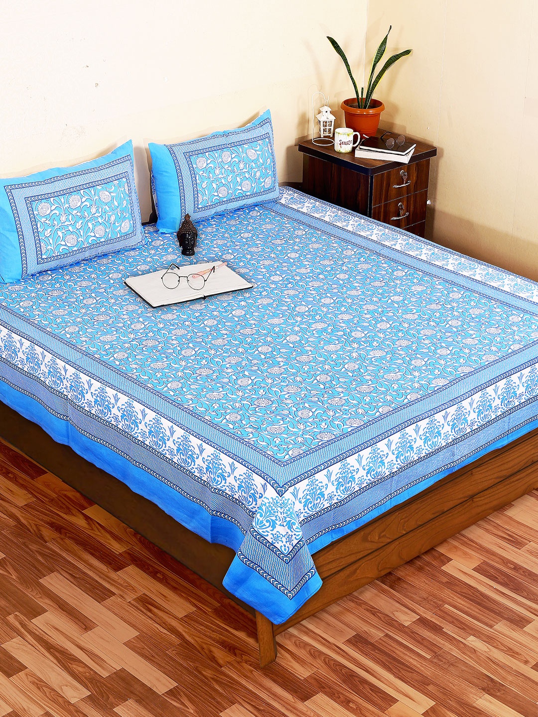 

Butea Crape Blue & White Floral 180 TC King Bedsheet with 2 Pillow Covers