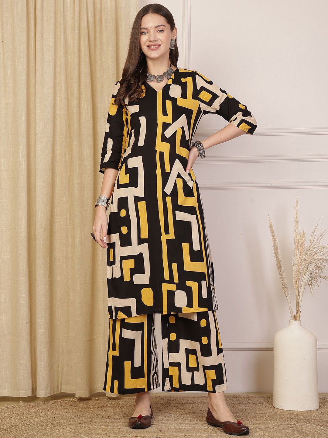 

Anouk Black And Yellow Geometric printed V-Neck Pure Cotton Kurta With Palazzos