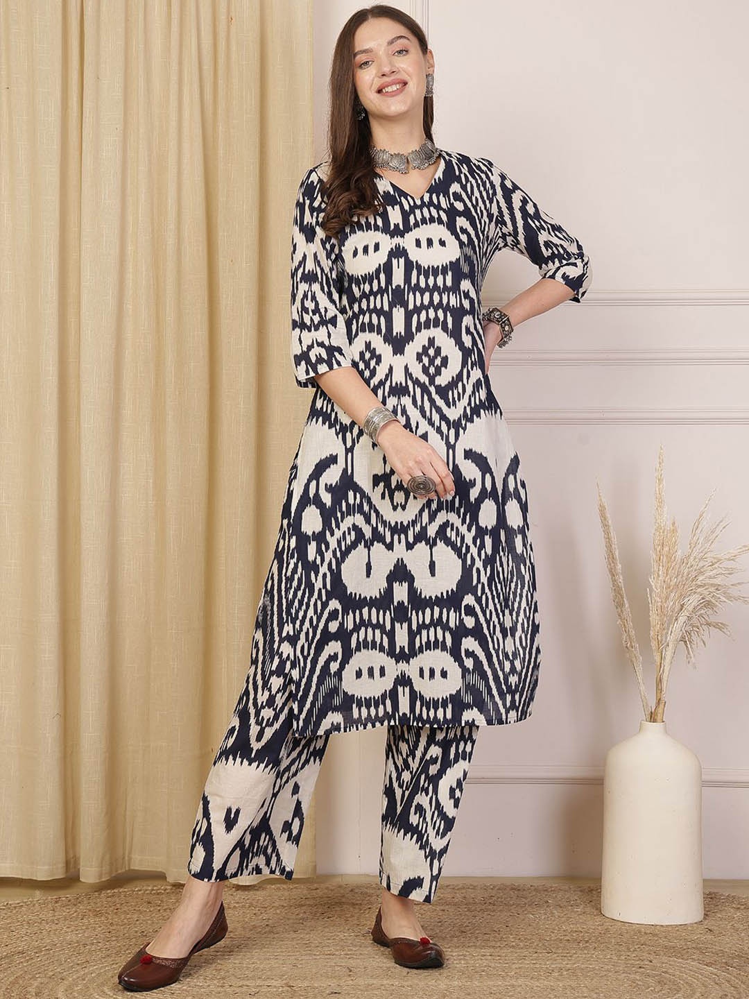 

Anouk Navy Blue Geometric printed V-Neck Pure Cotton Kurta With Palazzos