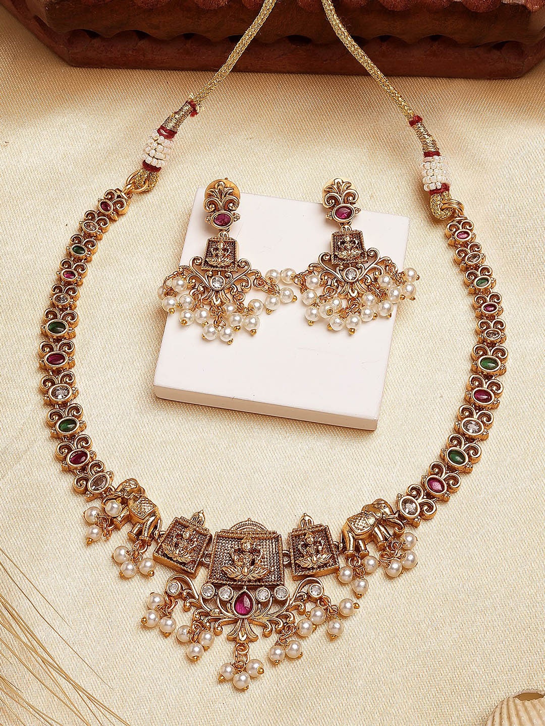 

KARATCART Gold-Plated Stone Studded & Beaded Studded Laxmi Mata Necklace and Earrings