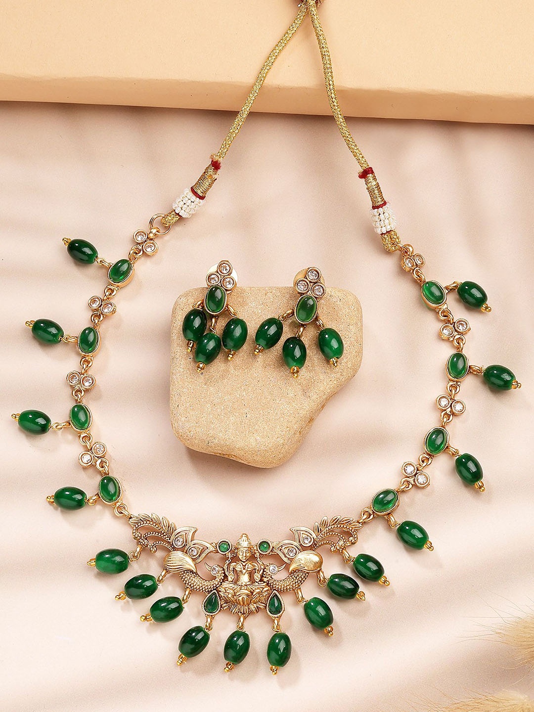 

KARATCART Gold-Plated Stone Studded & Beaded Laxmi Mata Temple Necklace and Earrings