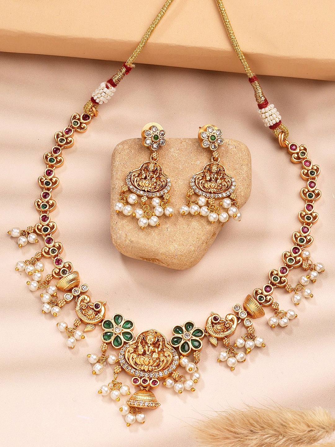 

KARATCART Gold-Plated Stone Studded & Beaded Laxmi Mata Necklace and Earrings