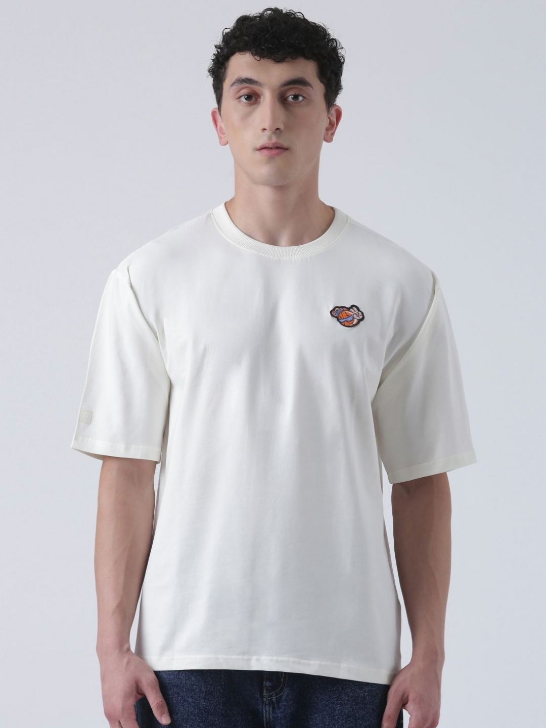 

FILA Unisex Typography Printed Drop-Shoulder Sleeves Cotton Oversized T-shirt, White