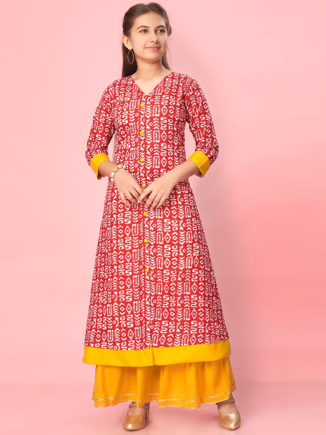 

Sangria Girls Red Ethnic Motifs Printed V-Neck Pure Cotton Round Neck A-Line Kurta