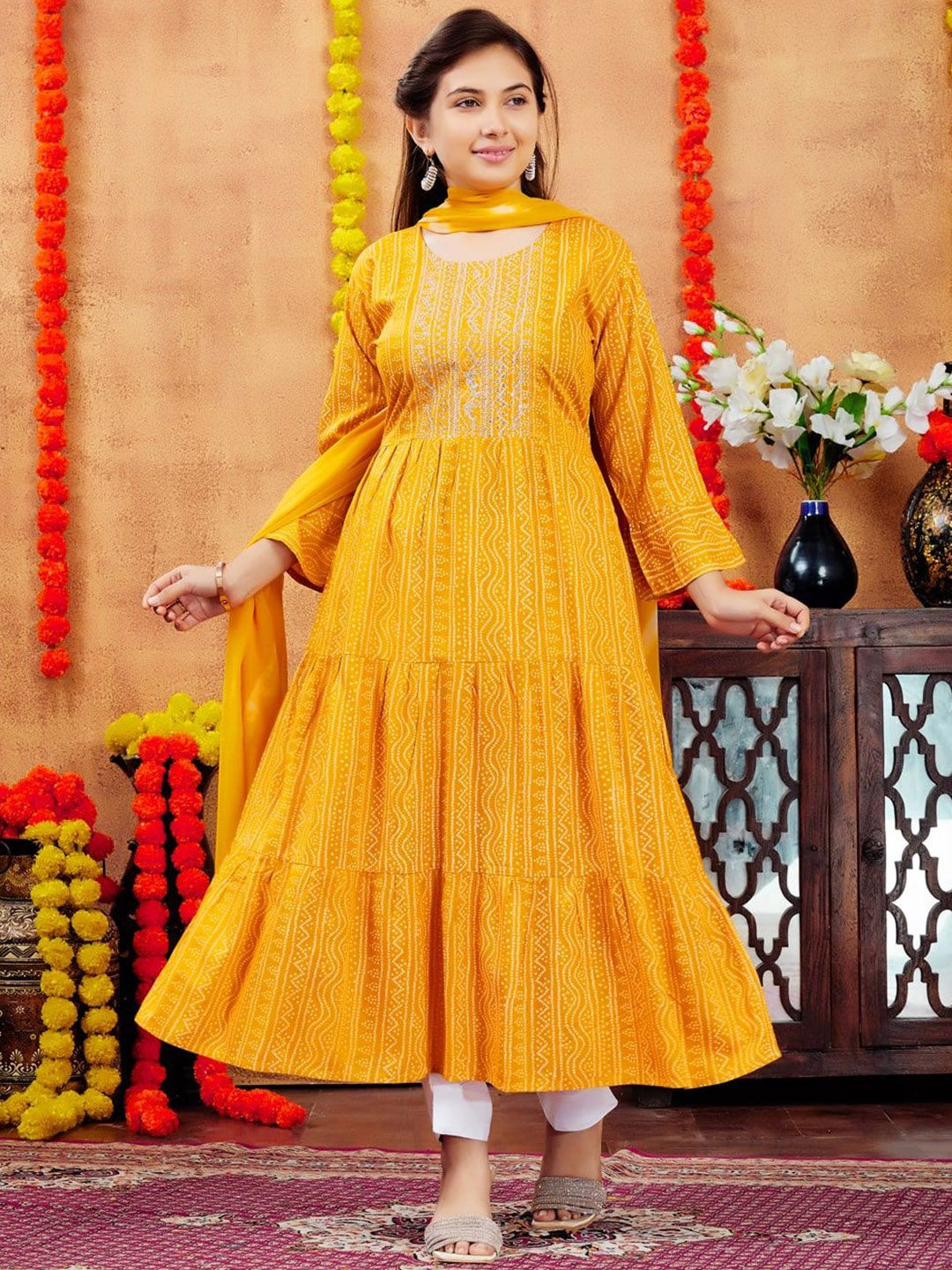 

Sangria Girls Yellow Bandhani Printed Tiered Sequinned Pure Cotton A-Line Kurta