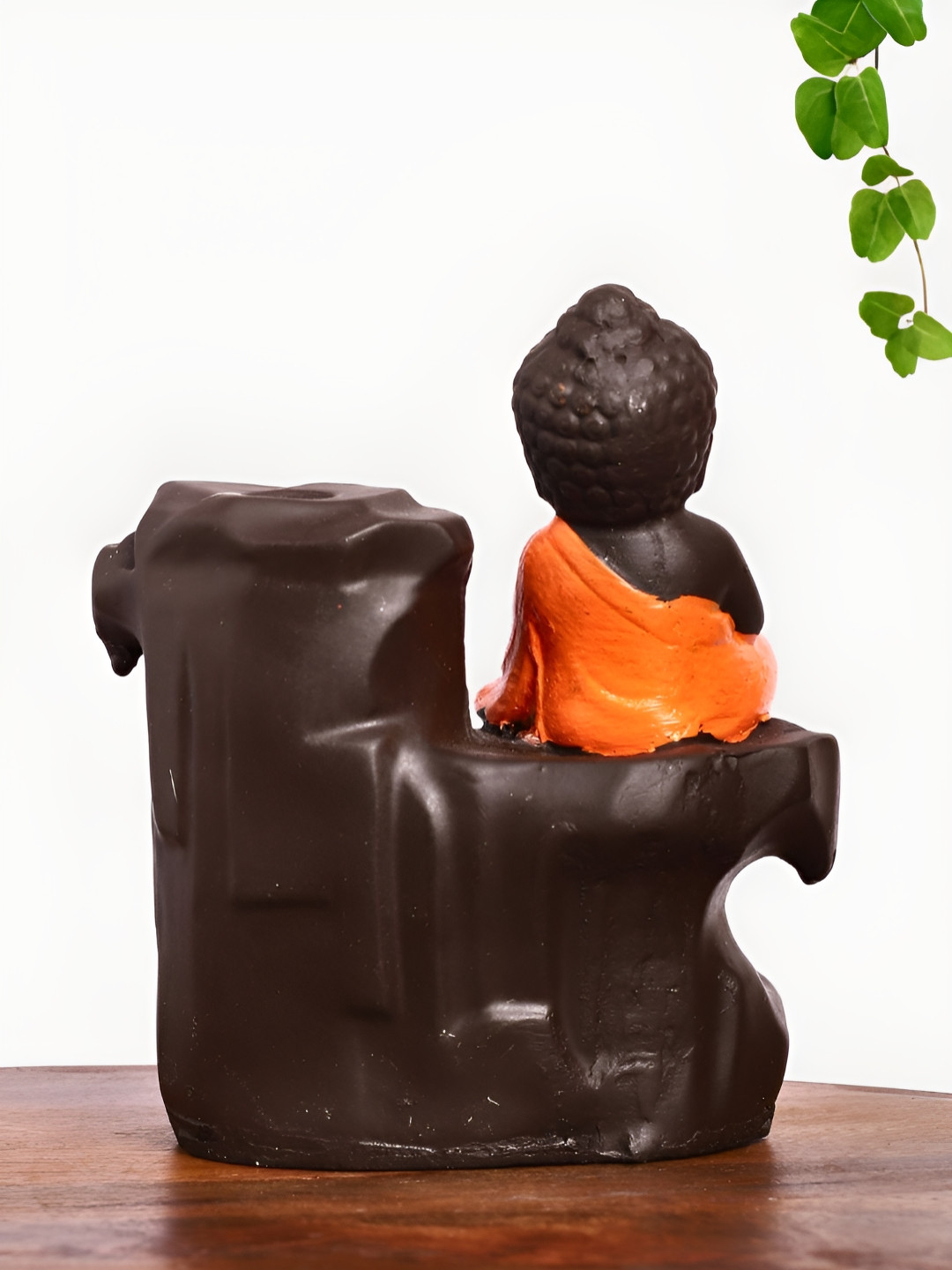 

INTERNATIONAL GIFT Orange Buddha Idol Showpiece