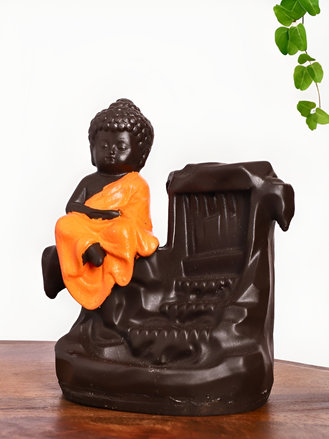 

INTERNATIONAL GIFT Orange Buddha Idol Showpiece