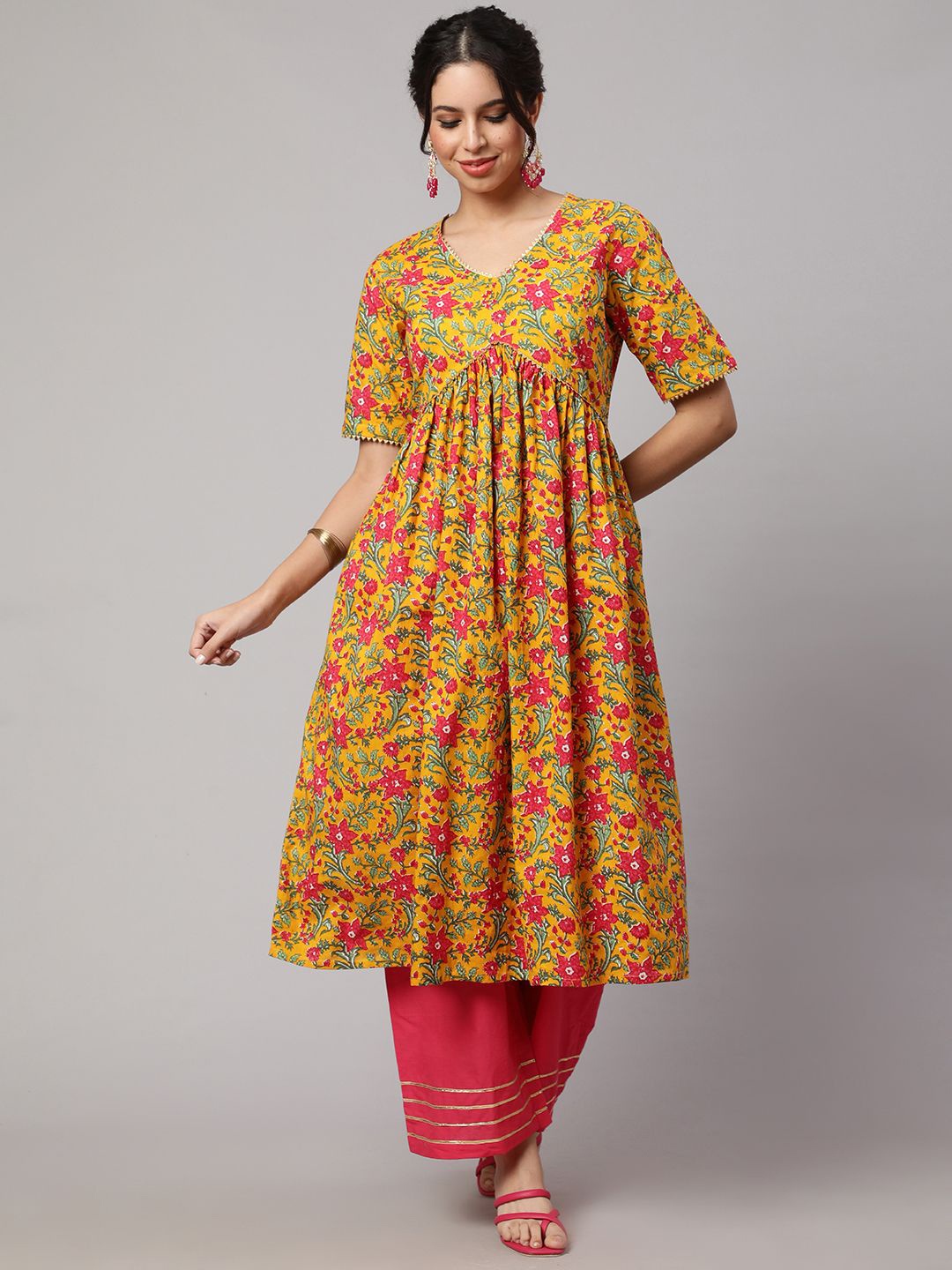 

Viharini Women Floral Printed Regular Pure Cotton Kurta with Palazzos, Mustard