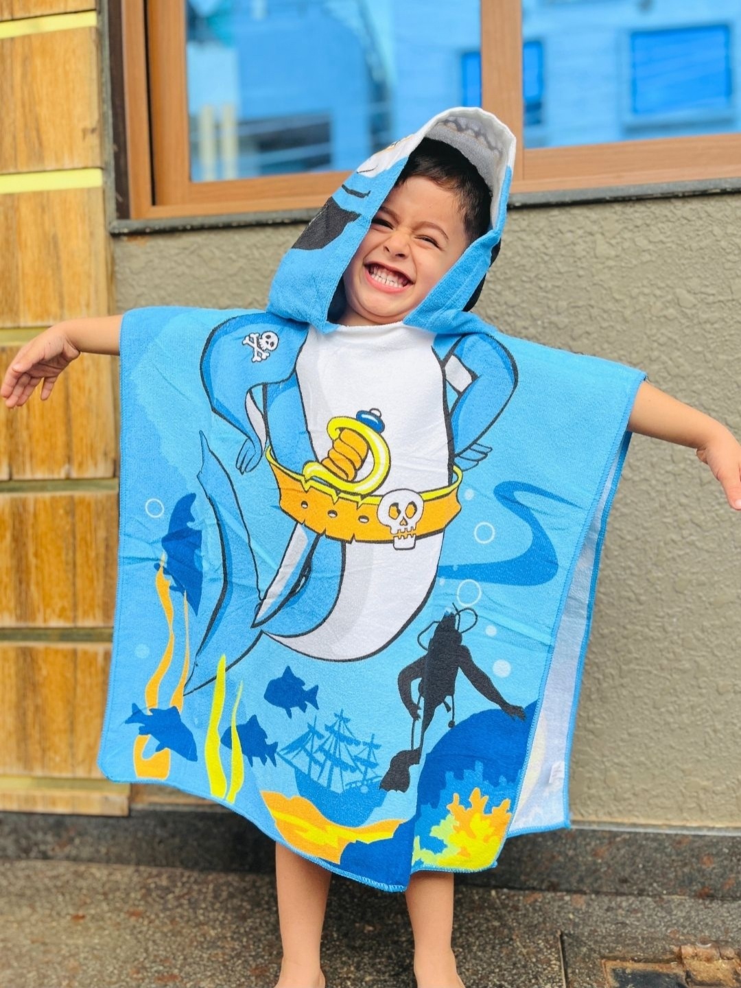 

Famyo Blue & White Pirate Baby Shark Design Poncho Towel for Kids (1-7 years)