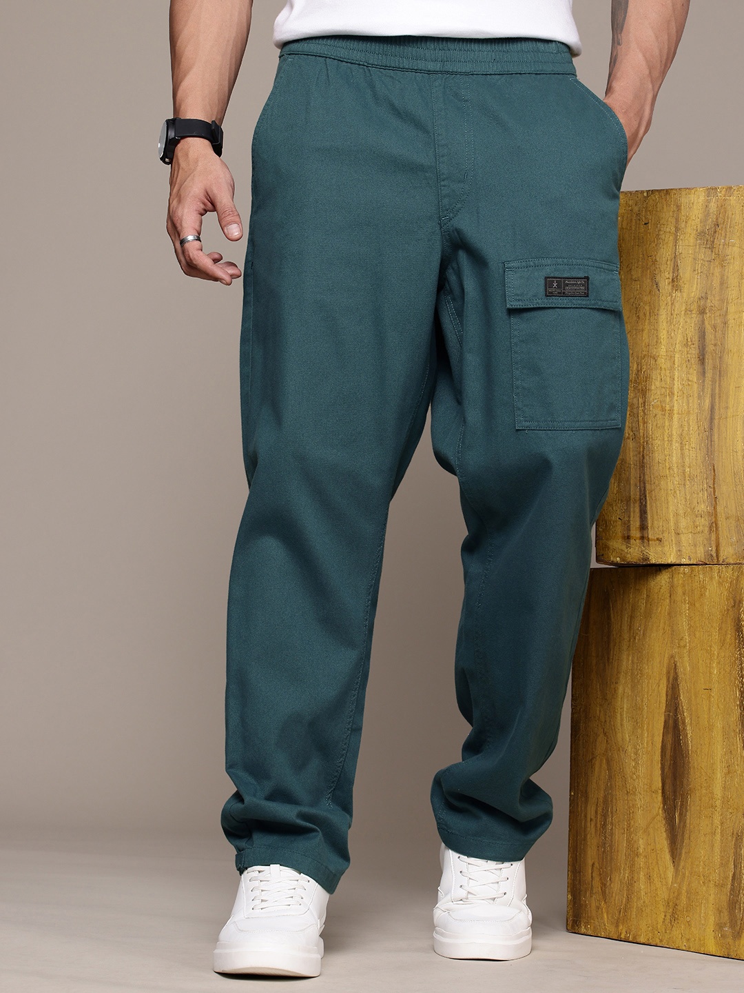 

The Roadster Lifestyle Co. Men Relaxed Pure Cotton Loose Fit Trousers, Teal