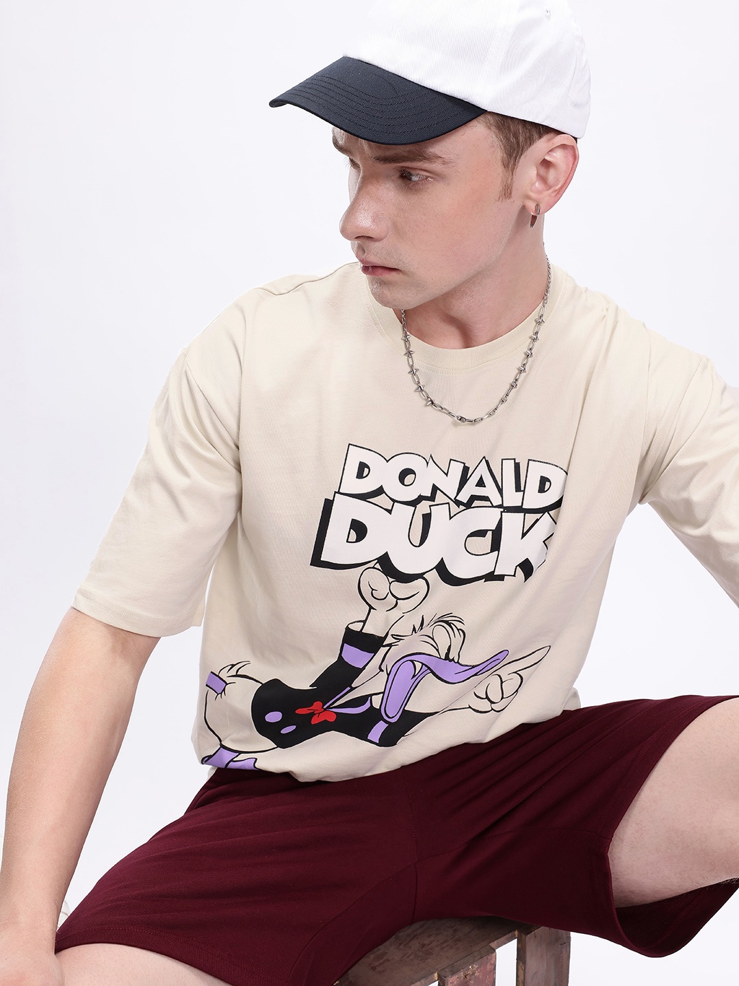 

Kook N Keech Men Donald Duck Printed Drop-Shoulder Sleeves Oversized Pure Cotton T-shirt, Beige