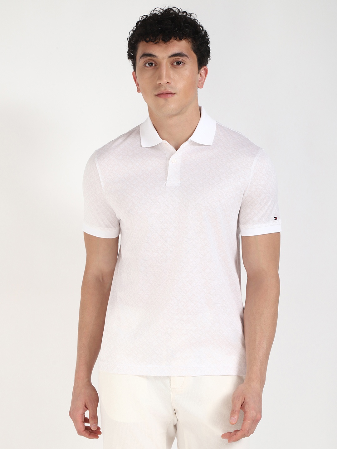 

Tommy Hilfiger Men Typography Printed Polo Collar Cotton T-shirt, Off white