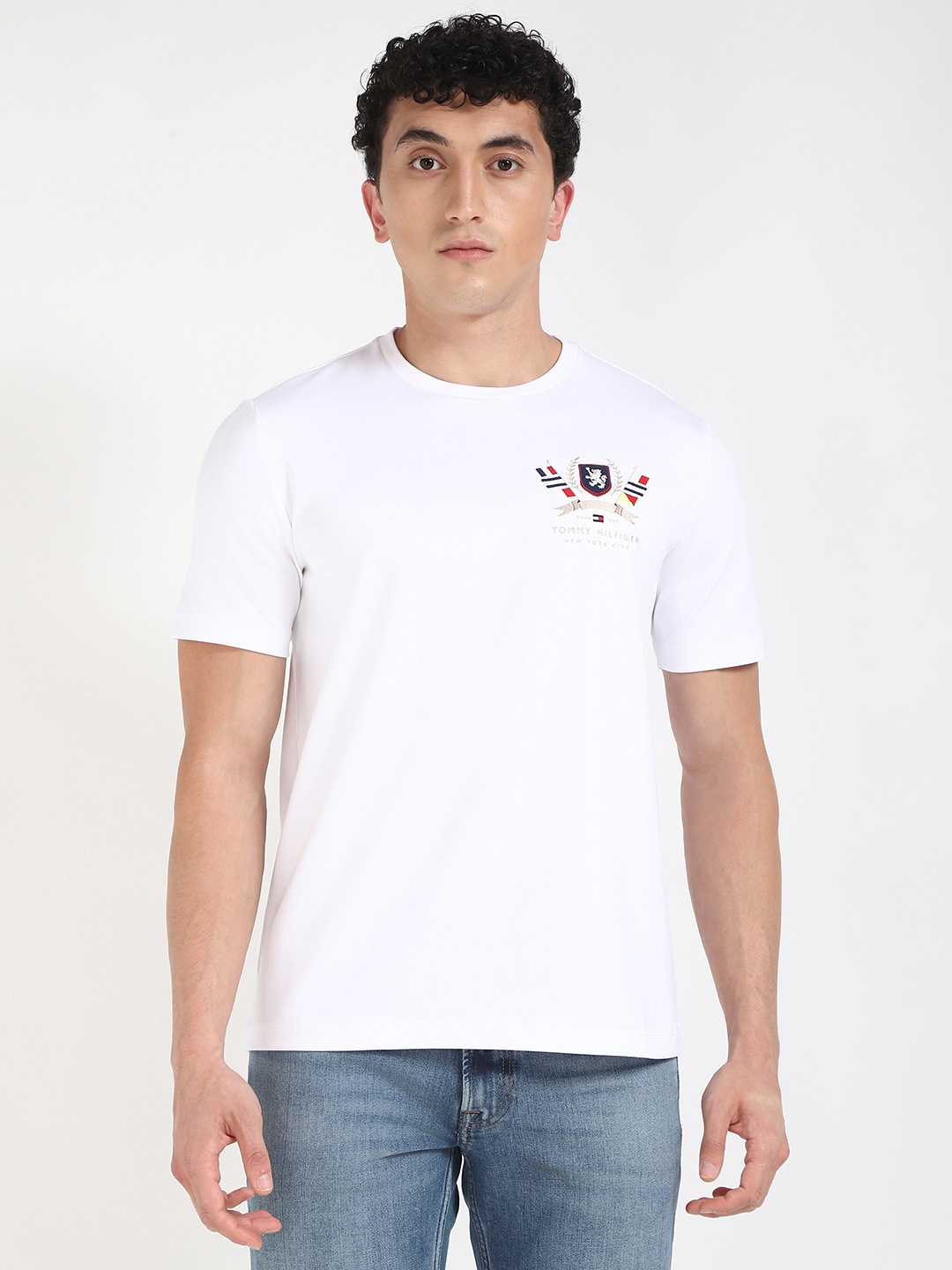 

Tommy Hilfiger Men Solid Round Neck Cotton T-shirt, White