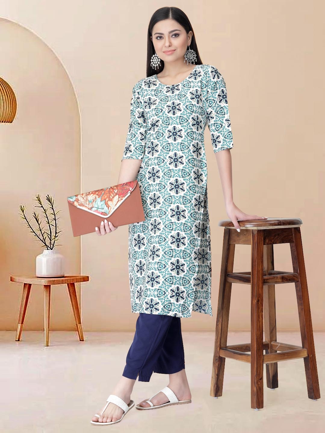 

Moda Rapido Women Ethnic Motifs Printed Regular Kurta with Trousers, Green